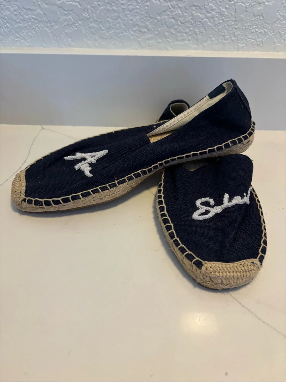 Soludos Black Canvas Slip-On Espadrilles with White Signature
